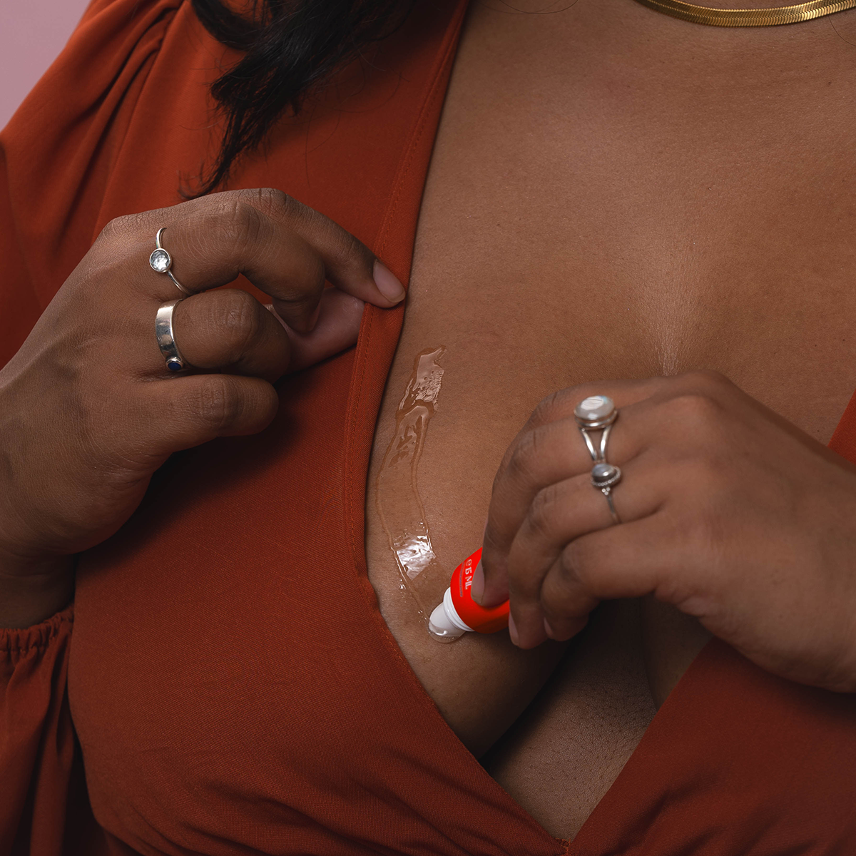 Apply clutch glue to your skin, then place your clothes on top for a strong hold as long as you need, then comes out in the wash. Use on low cut tops and dresses to stop wardrobe malfunctions.