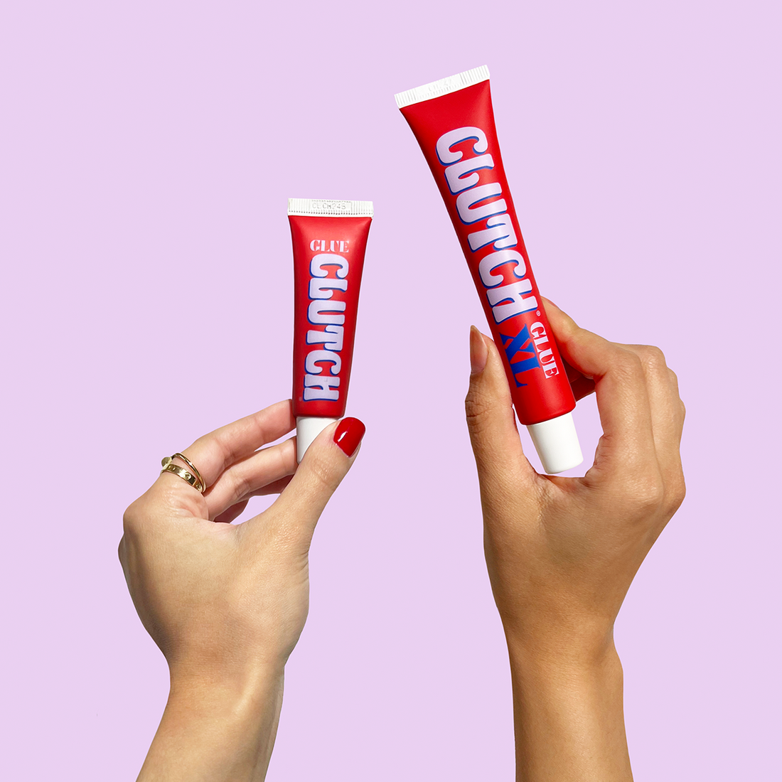 Clutch Glue tubes held in hand