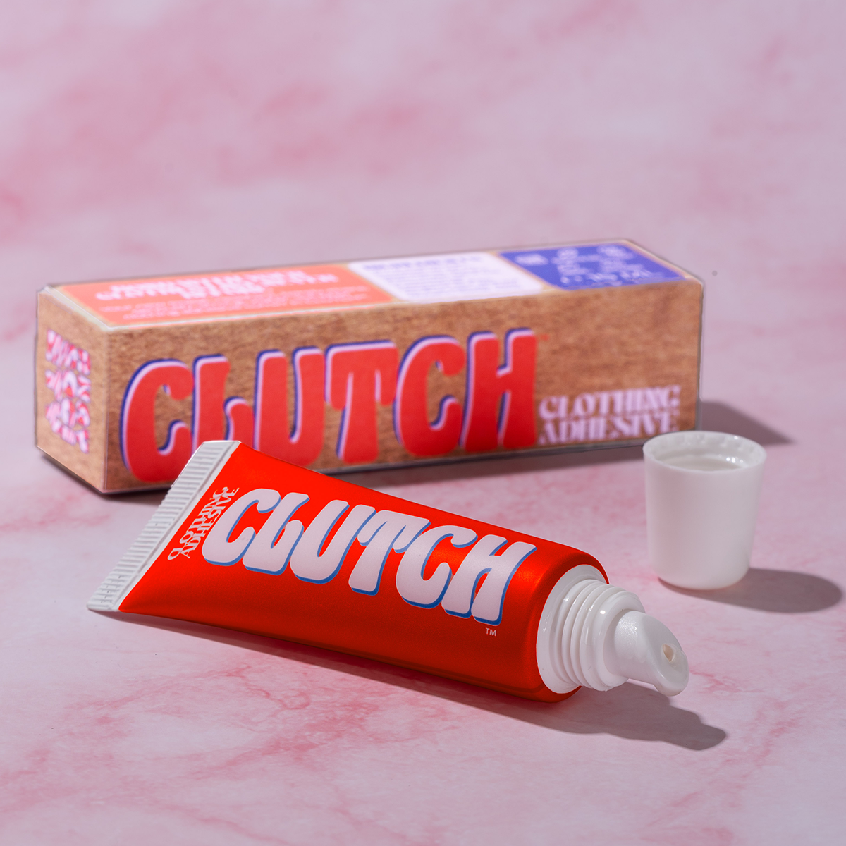 Modern new approach to fashion tape and hollywood tape, clutch glue clothing adhesive applies as much or as little glue to your skin as you need to hold your clothes in place