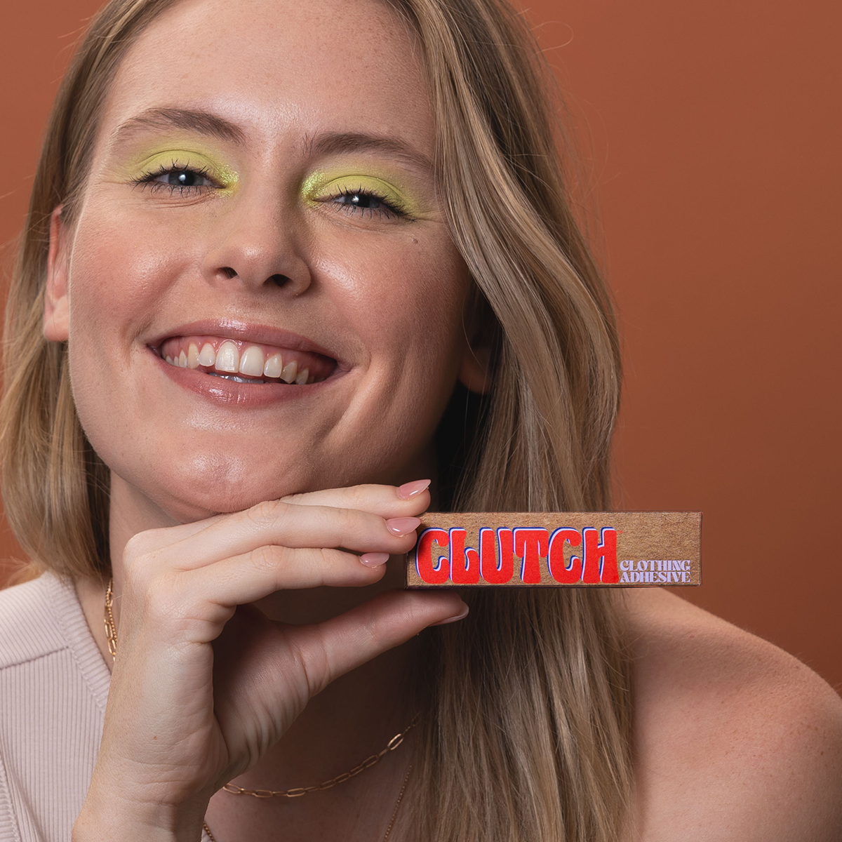 Sustainable and effective alternative to fashion tape and hollywood tape, clutch glue is a clothing adhesive that holds your clothes in place then washes right out